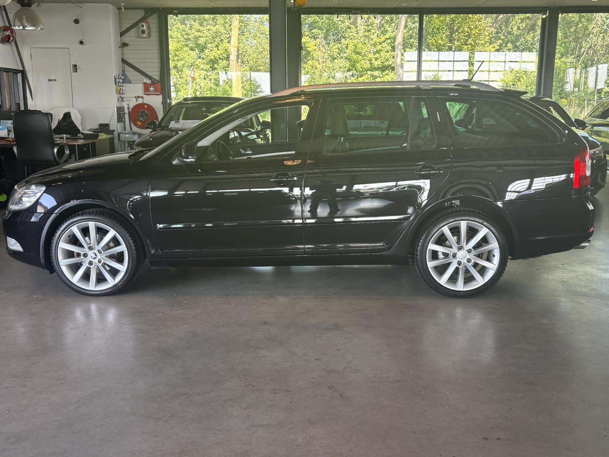 Skoda Octavia Combi 1.2 TSI Elegance Business Line, Auto's, Euro 5, Stof, Gebruikt, 4 cilinders