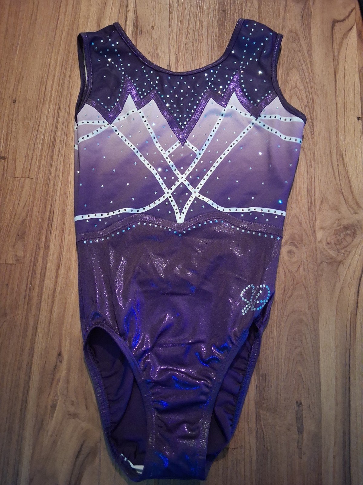 Sparkle&Dream turnpakje puck paars, Sport en Fitness, Paars, Ophalen of Verzenden, Zo goed als nieuw, Turnpak(je)