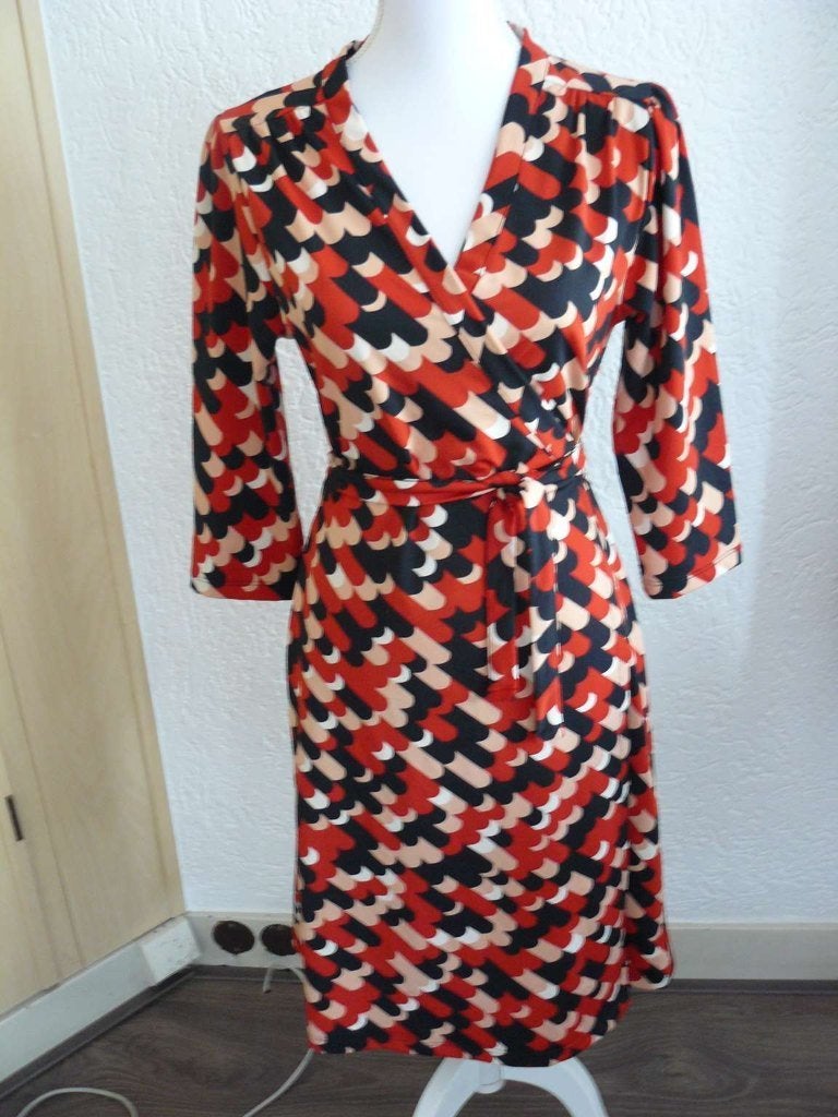 King Louie wikkeljurk maat M., Kleding | Dames, Jurken, Maat 38/40 (M), Overige kleuren, Ophalen of Verzenden, Zo goed als nieuw