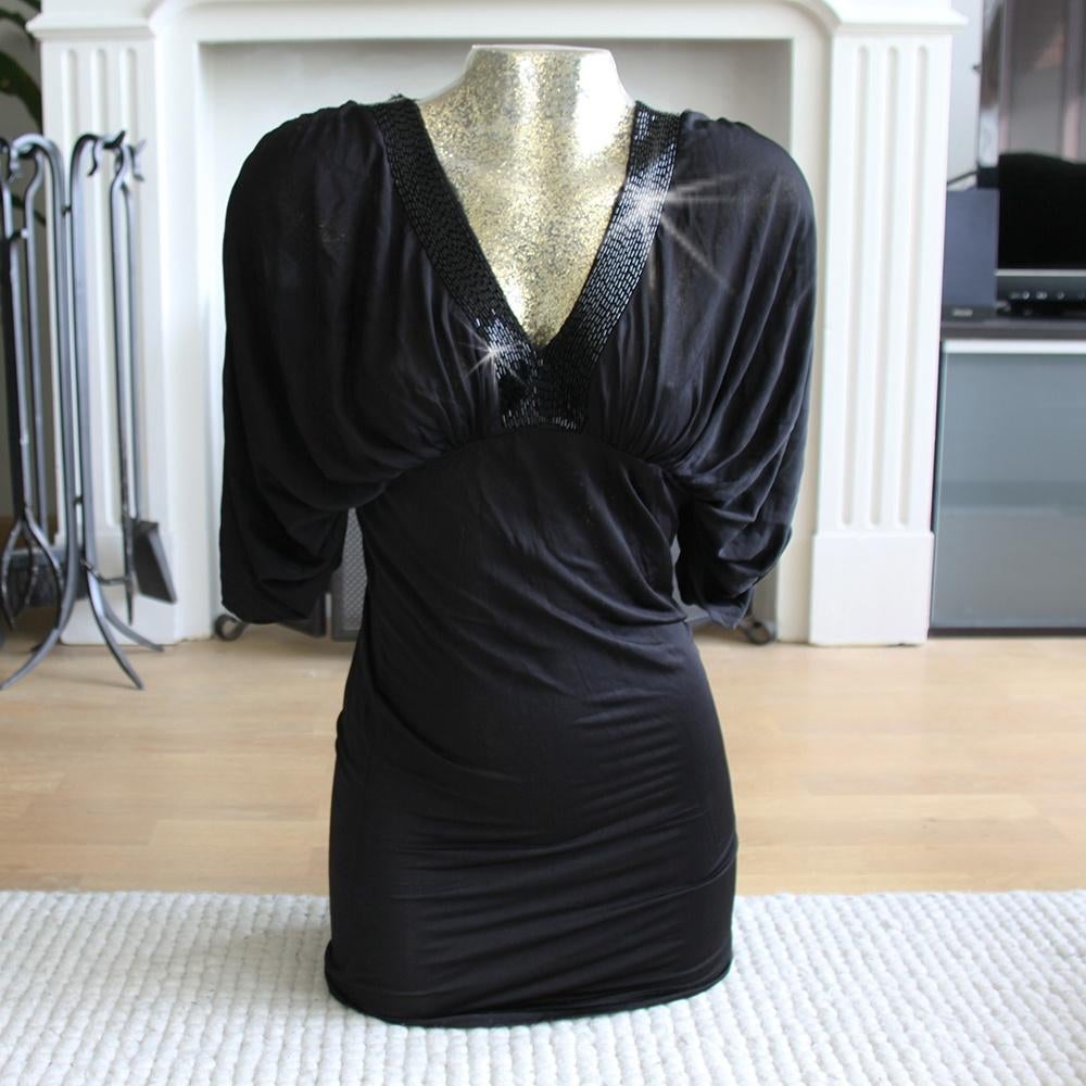 Zeer Mooie Super Star Glitter Tuniek (XS) € 25,-, Super Star, Zwart, Ophalen of Verzenden, Zo goed als nieuw