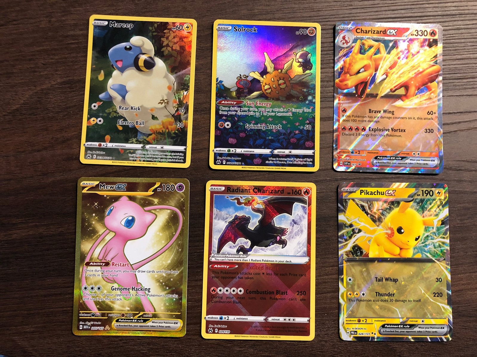 Pokémon kaarten: Pikachu, Charizard, Mew, Mareep, Solrock, Ophalen of Verzenden, Zo goed als nieuw, Meerdere kaarten, Foil