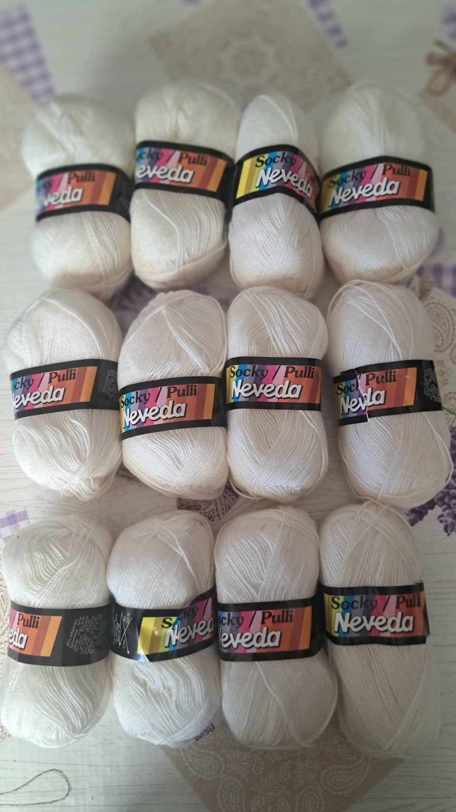 Partijtje Neveda Socky Pulli wol - 12 bollen wit sokkenwol, Ophalen of Verzenden, Nieuw, Breien of Haken, Wol of Garen