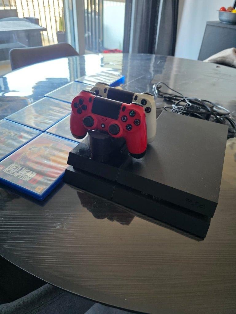 Playstation 4 | 2 consoles | Houder en Oplader | 7 Games, Met 2 controllers, Ophalen of Verzenden, Zo goed als nieuw, Original