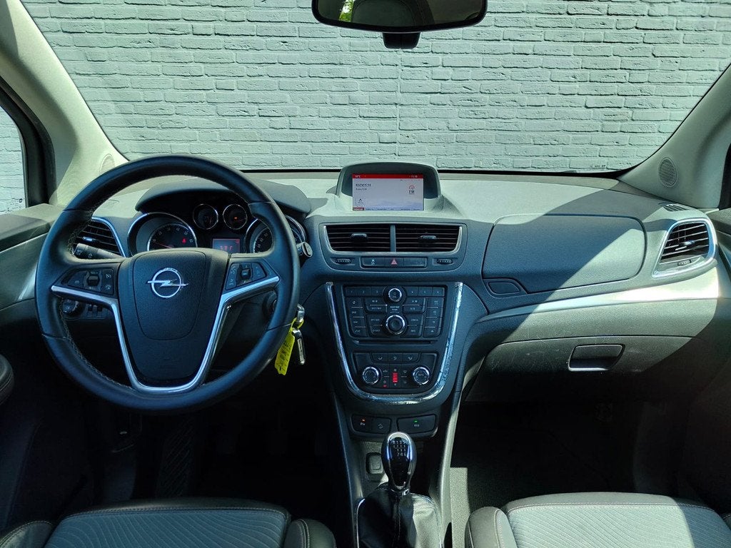Opel Mokka 1.4T 141pk Cosmo Trekhaak Navi Camera AGR Comfort, Auto's, Opel, Voorwielaandrijving, Euro 5, 4 cilinders, Leder en Stof