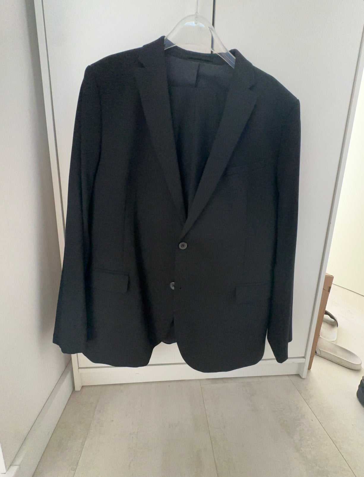 Een mooie slimfit herenpak in het zwart maat 56., Ophalen of Verzenden, Zo goed als nieuw, Maat 56/58 (XL), Zwart