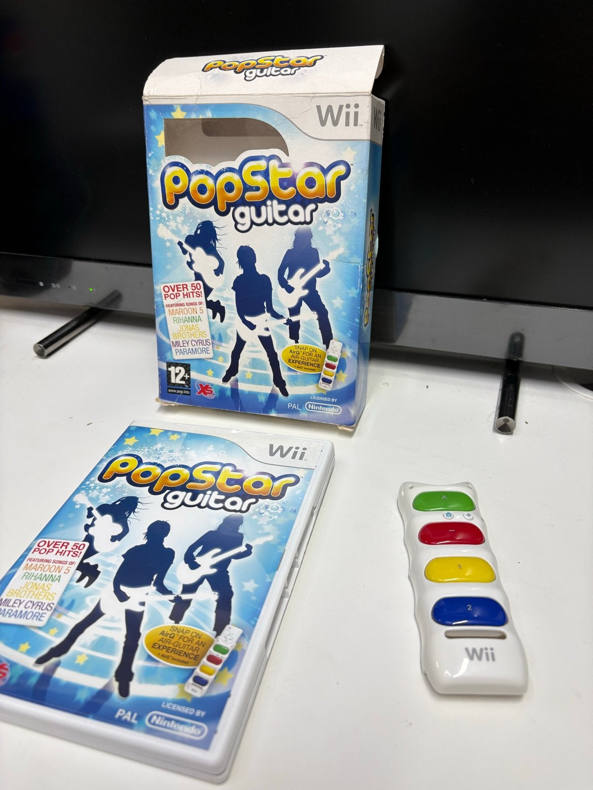 PopStar Guitar Wii met Air-Guitar accessoire, Spelcomputers en Games, Games | Nintendo Wii, Muziek, Eén computer, Ophalen of Verzenden