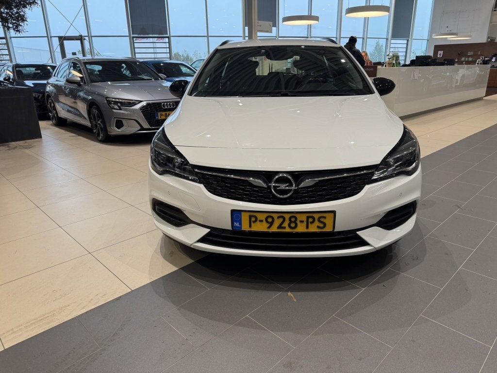 Opel Astra Sports Tourer 1.2 Edition, Auto's, Gebruikt, Euro 6, 1199 cc, Wit