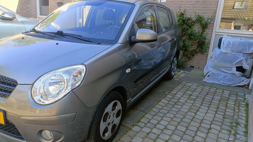 Kia Picanto 1.0 2010 Grijs, Auto's, 4 cilinders, 400 kg, Adaptieve lichten, Origineel Nederlands