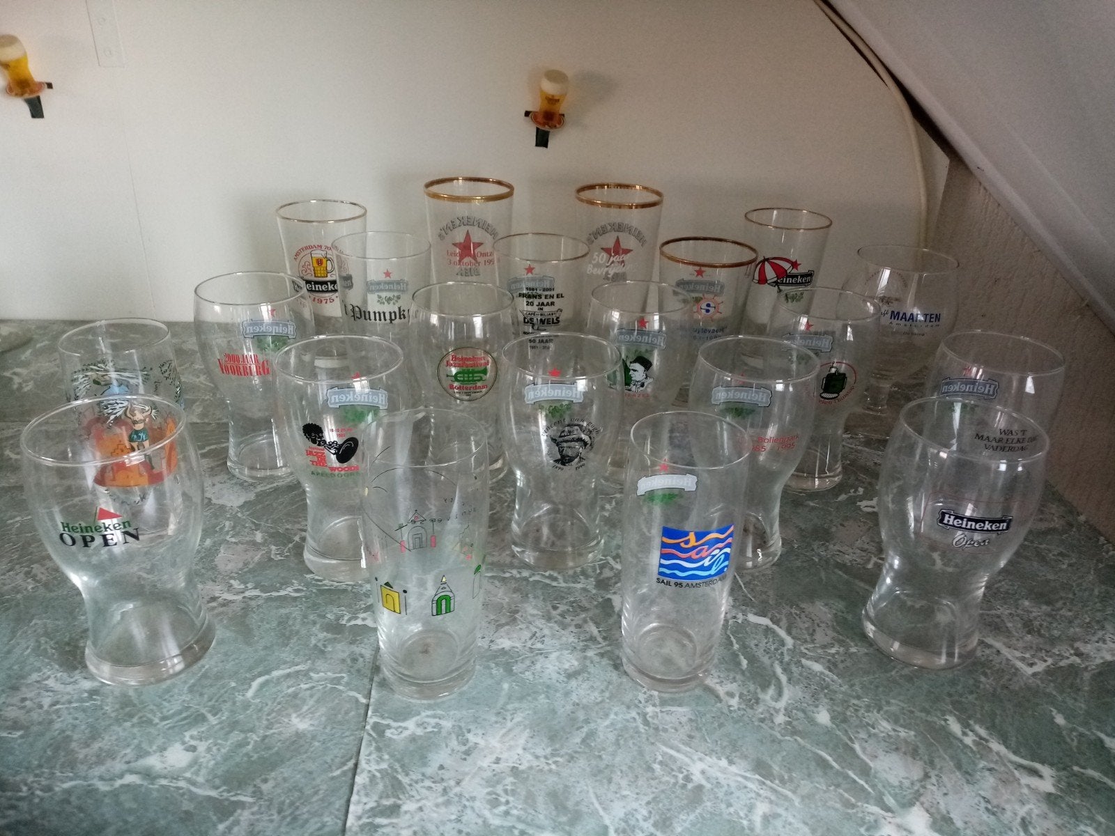 21 Heineken bierglazen met speciale opdruk, Verzamelen, Glas en Borrelglaasjes, Ophalen of Verzenden, Zo goed als nieuw, Bierglas