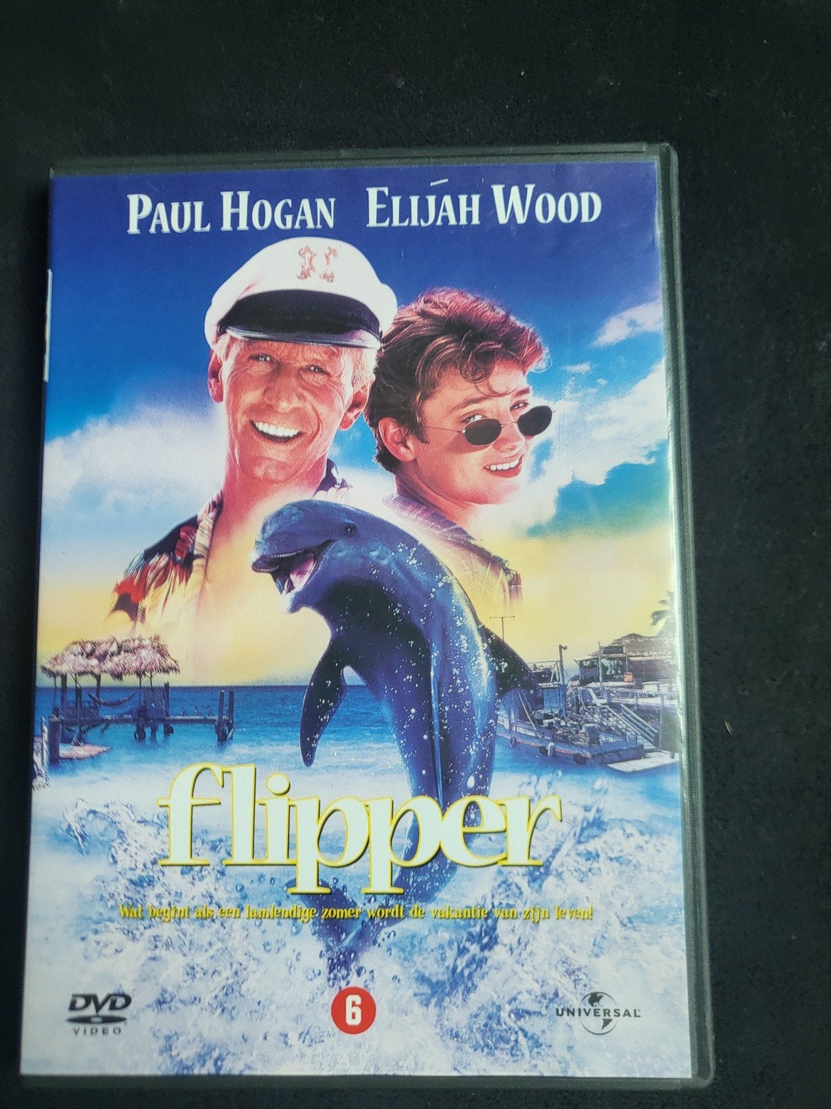 Flipper DVD - Familieavontuur met Paul Hogan & Elijah Wood, Gebruikt, Alle leeftijden, Spaans, Ophalen of Verzenden