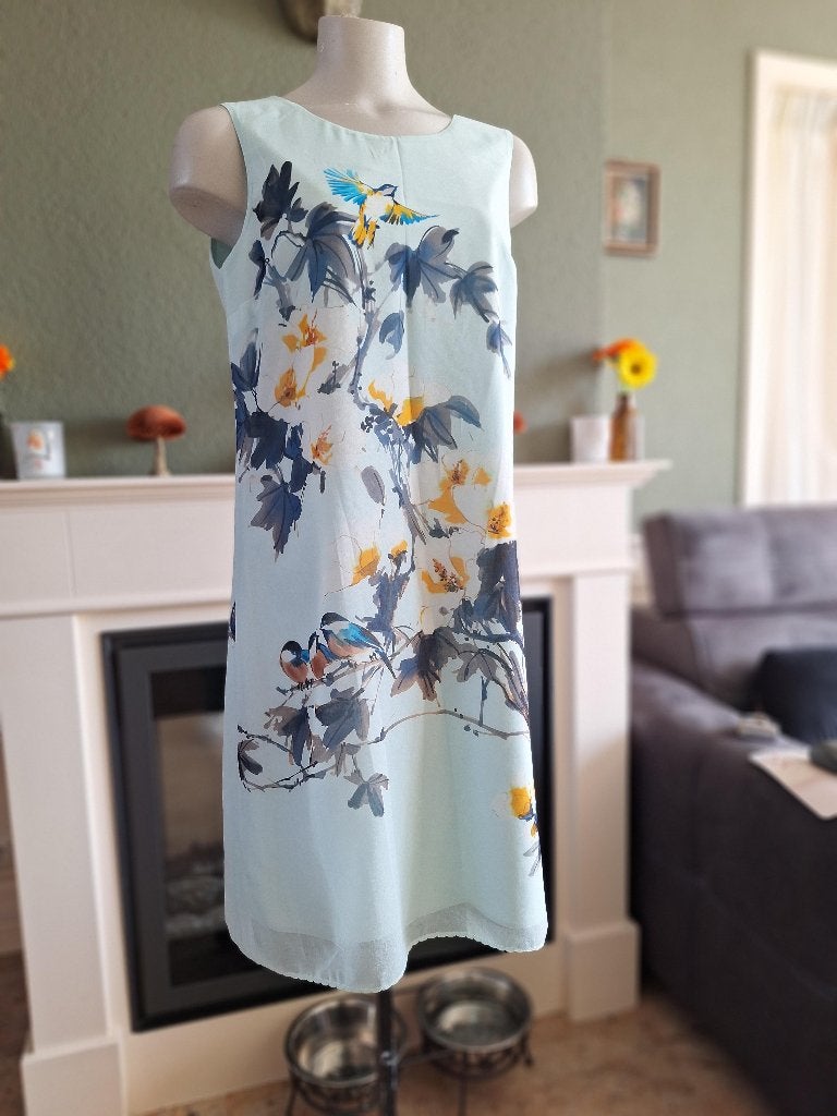 Xandres mint kleur vogel jurk zo mooi 40, Maat 38/40 (M), Zo goed als nieuw, Knielengte, Xandres
