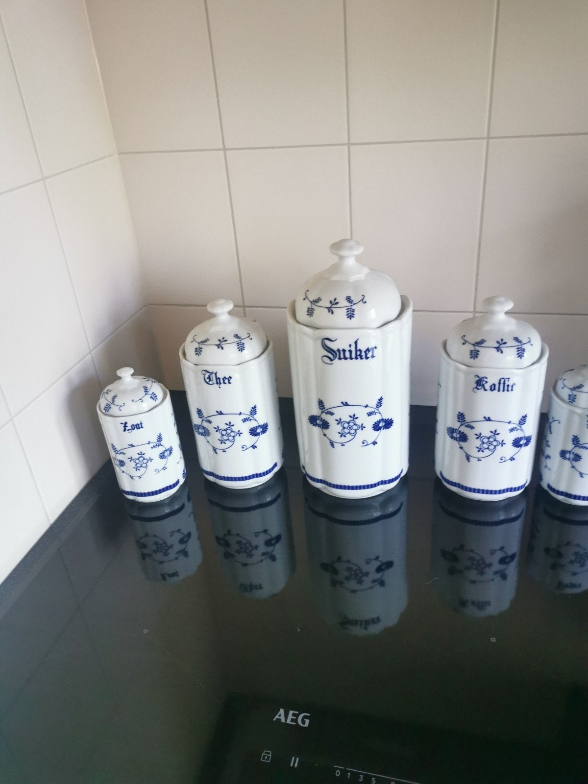 vijf voorraadpotten ipst, Ophalen