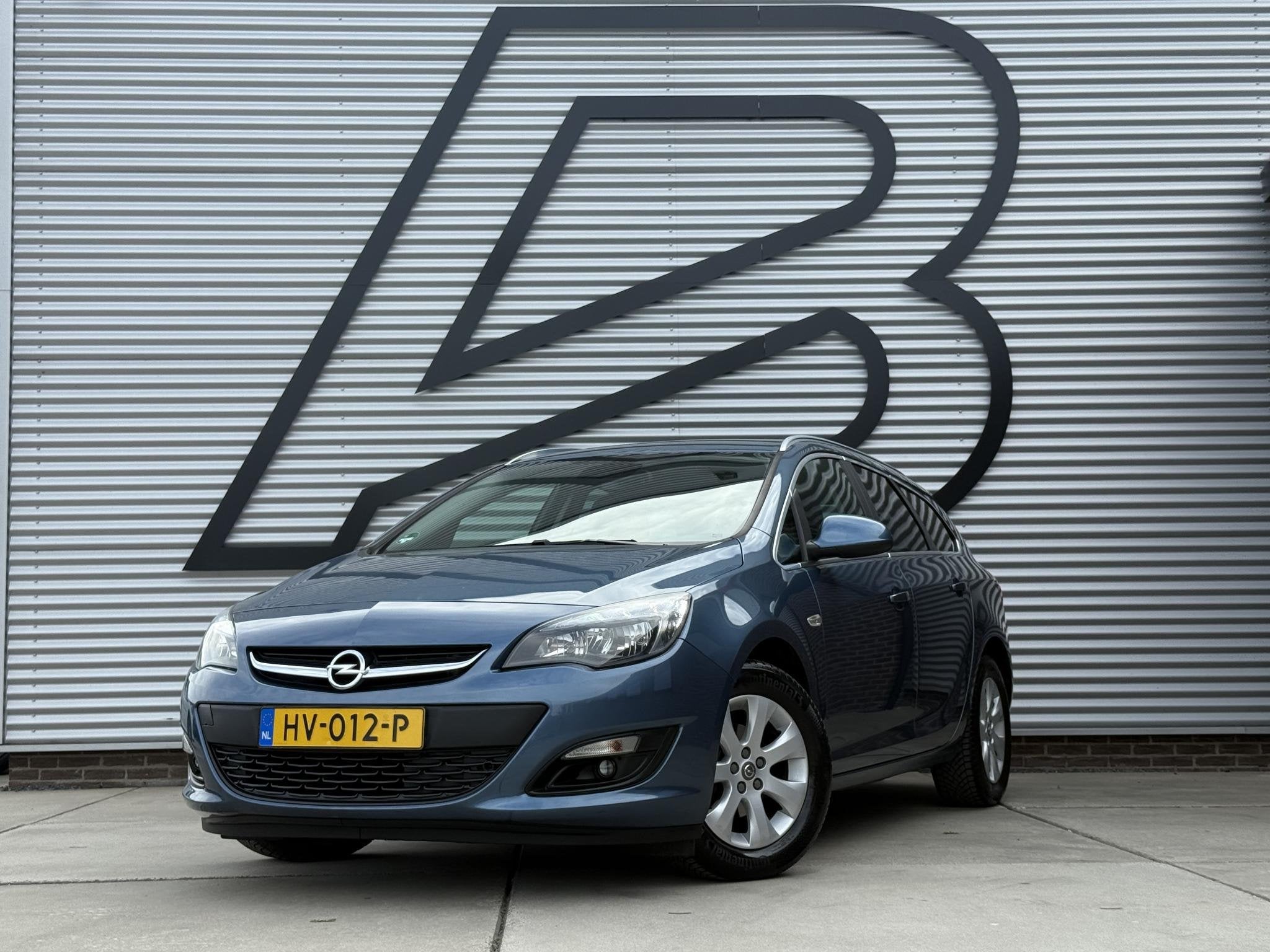 Opel Astra Sports Tourer 1.4 Turbo Blitz 1e Eigenaar|Navi|Ai, Auto's, Voorwielaandrijving, Stof, Gebruikt, 4 cilinders