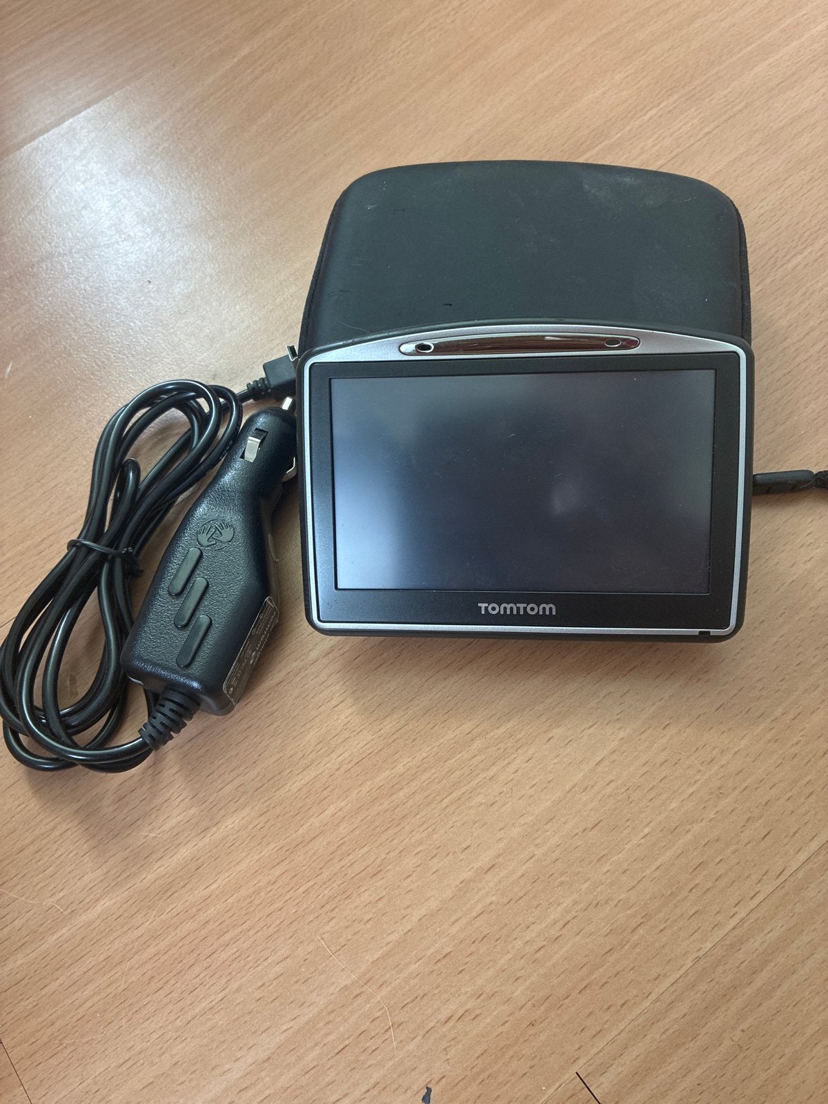 TomTom navigatiesysteem met oplader en hoes, Ophalen of Verzenden, Gebruikt