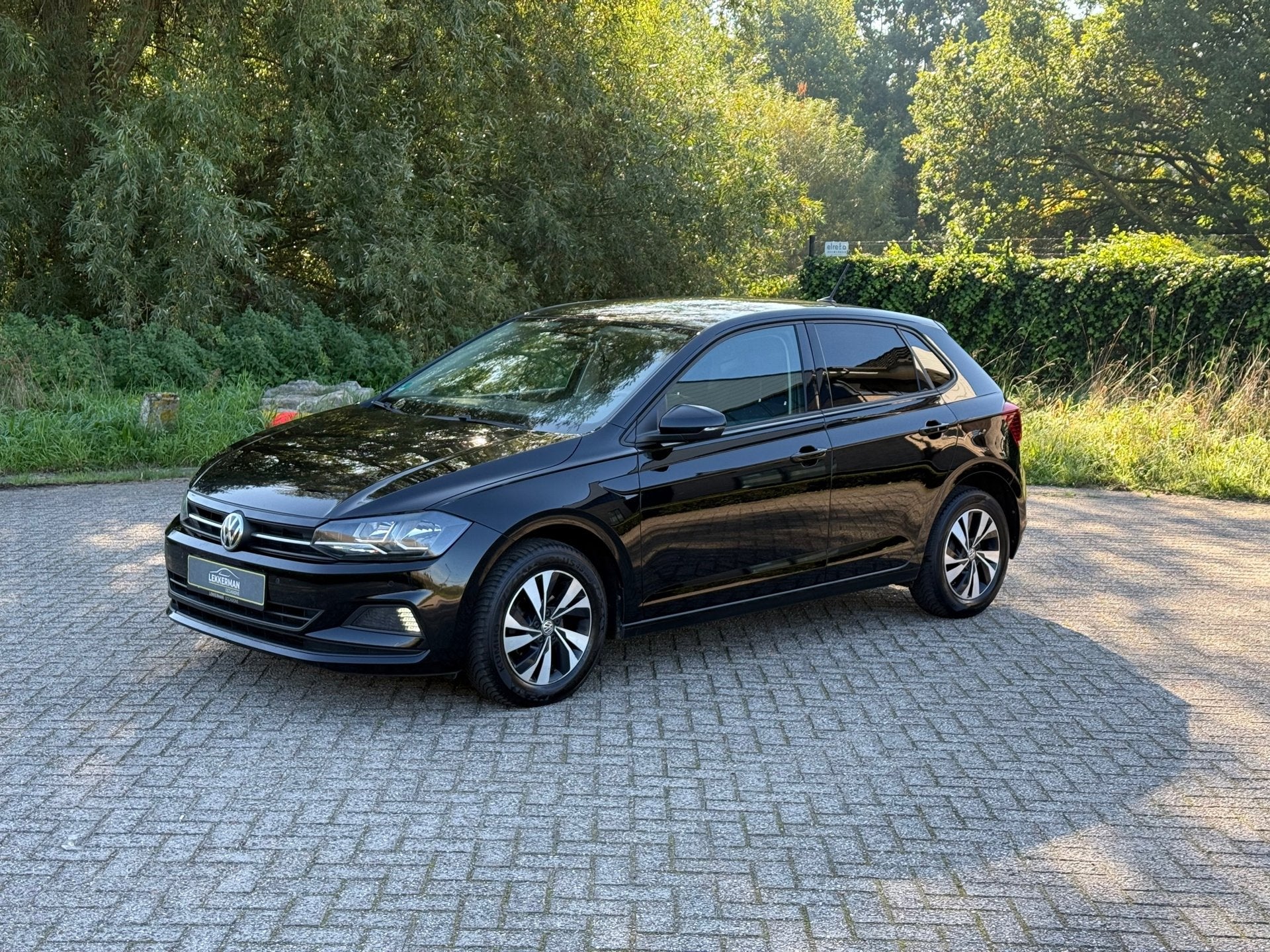 Volkswagen Polo 1.0 TSI Highline DSG I NAVI I PDC I STOELVER, Auto's, Gebruikt, 95 pk, 1096 kg, Zwart