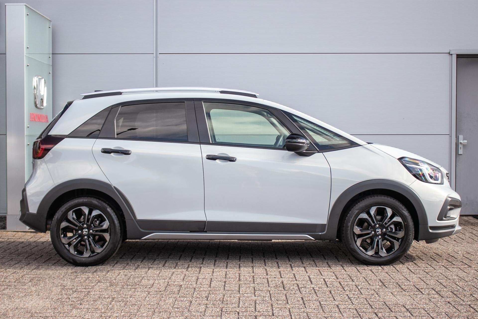 Honda Jazz 1.5 e:HEV Advance Crosstar -Navi | Apple/Android, Auto's, Honda, Zwart, 4 cilinders, Leder en Stof, Origineel Nederlands