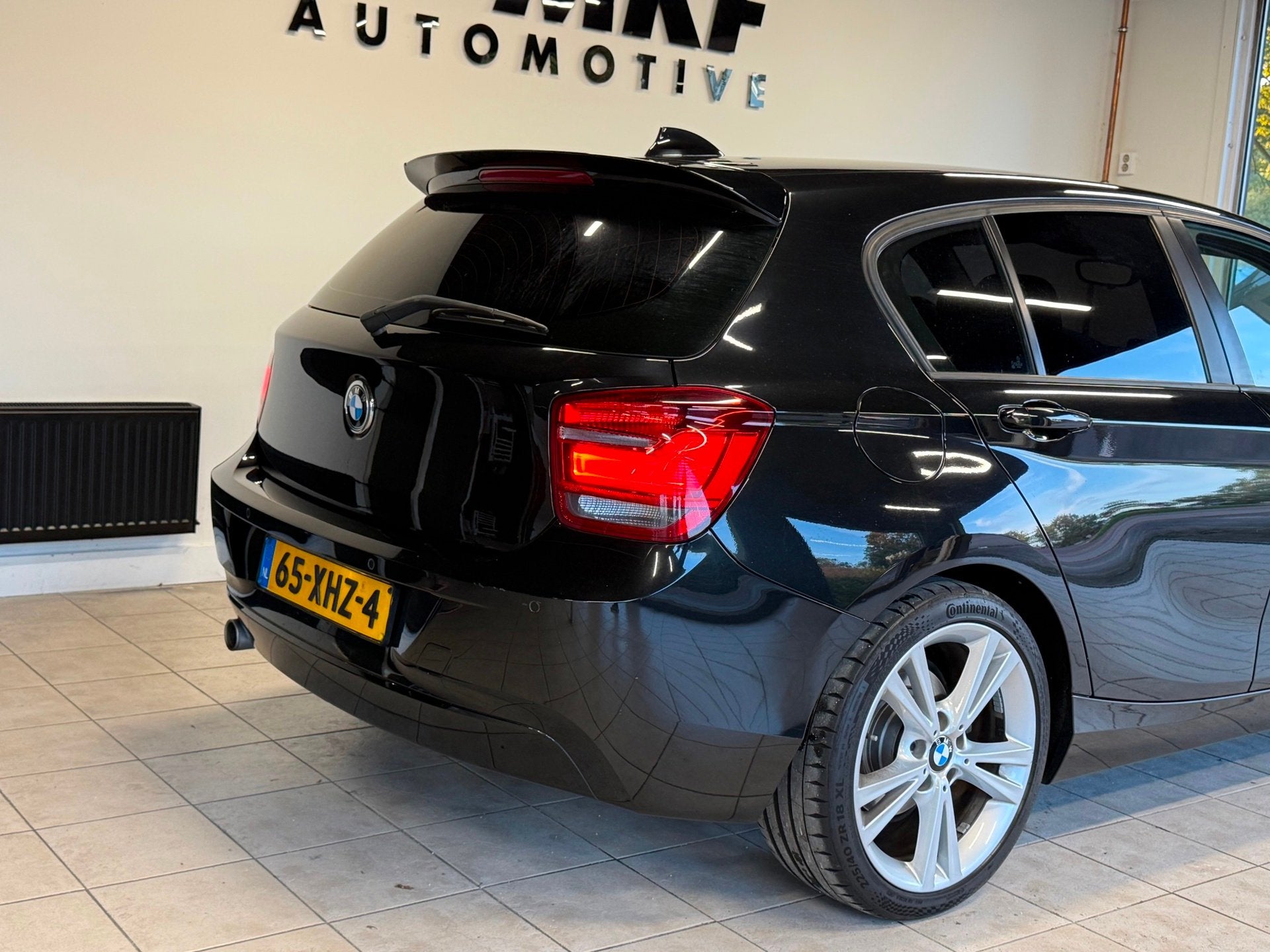 Foto 17 van BMW 1-serie 116D Business 2012 Zwart AIRCO|NAVI|XENON|NAP!