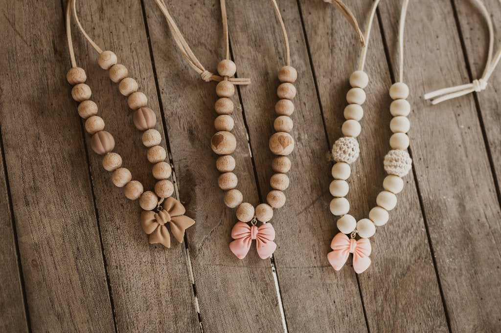 kindersieraden ketting strikje, Sieraden, Tassen en Uiterlijk, Kindersieraden, Ophalen of Verzenden, Nieuw, Roze, Ketting