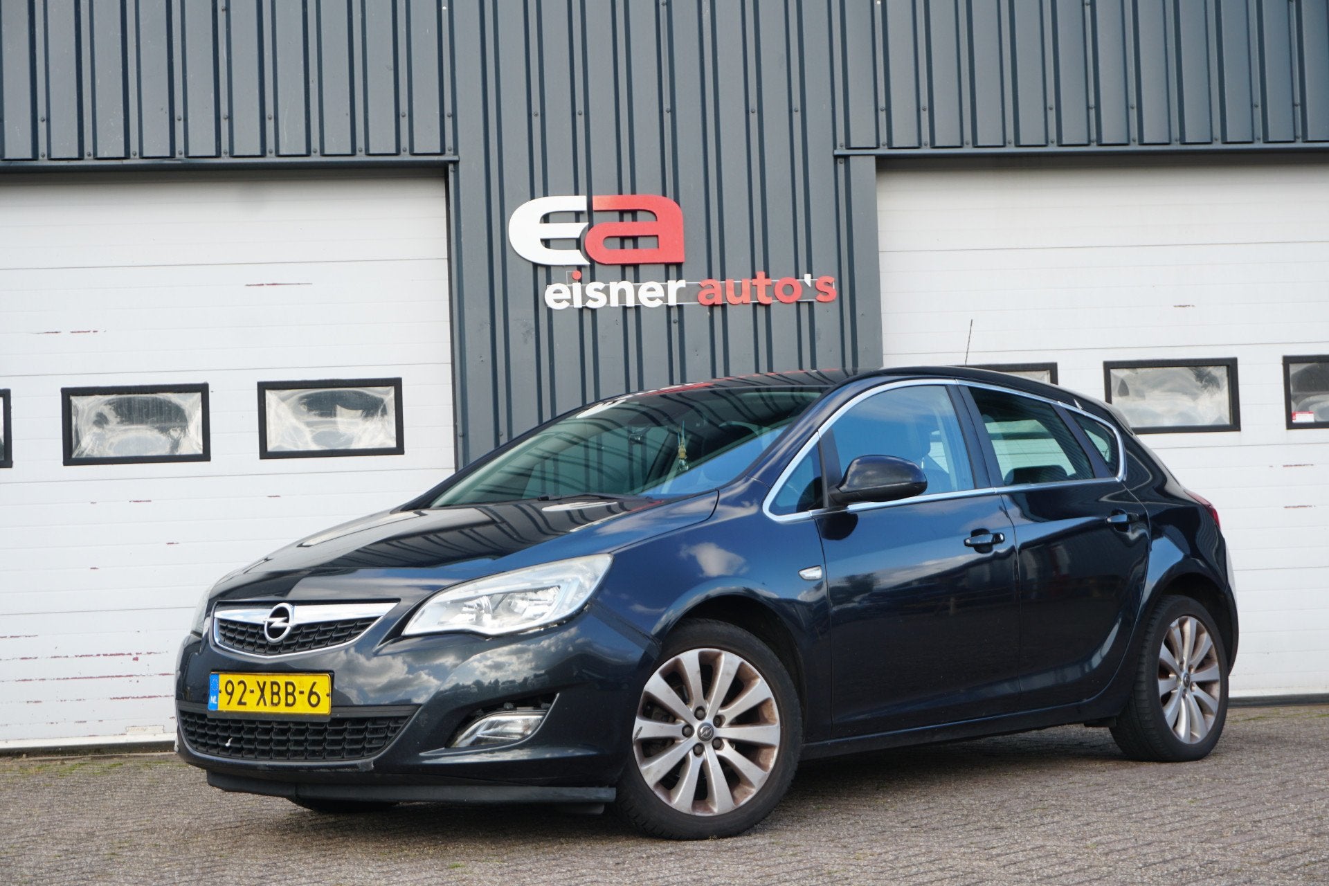 Opel Astra 1.4 Turbo Anniversary Edition (bj 2012), Auto's, Voorwielaandrijving, Euro 5, Stof, Gebruikt