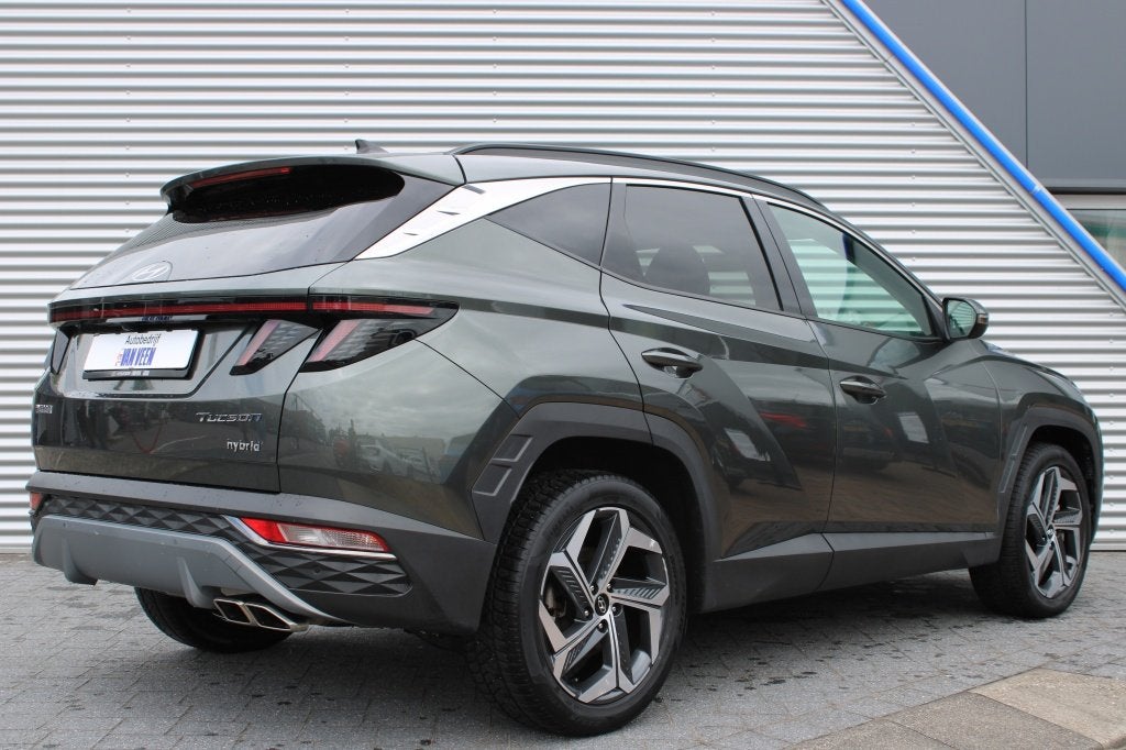 Hyundai Tucson 1.6 T-GDI HEV Comfort Smart | 1650 kg trekgew, Stof, Gebruikt, Zwart, 4 cilinders