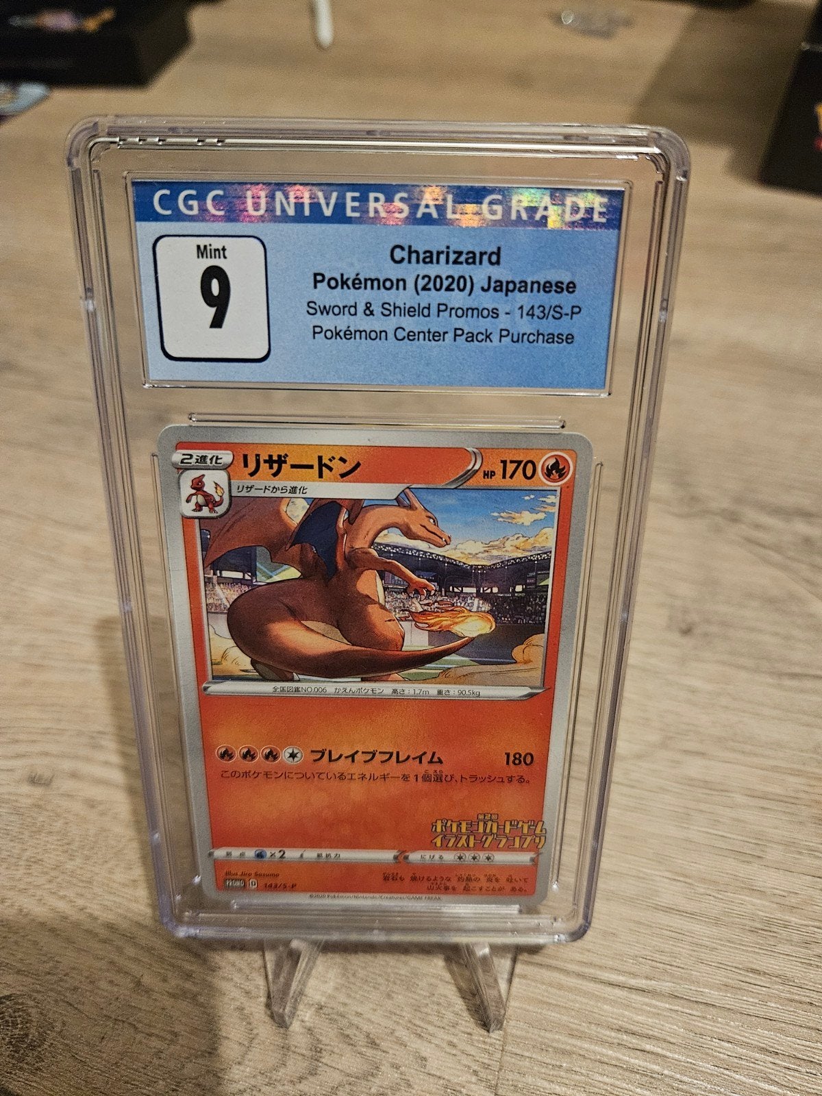 charizard pokemon center pack purchase #143/S-P cgc 9, Ophalen of Verzenden