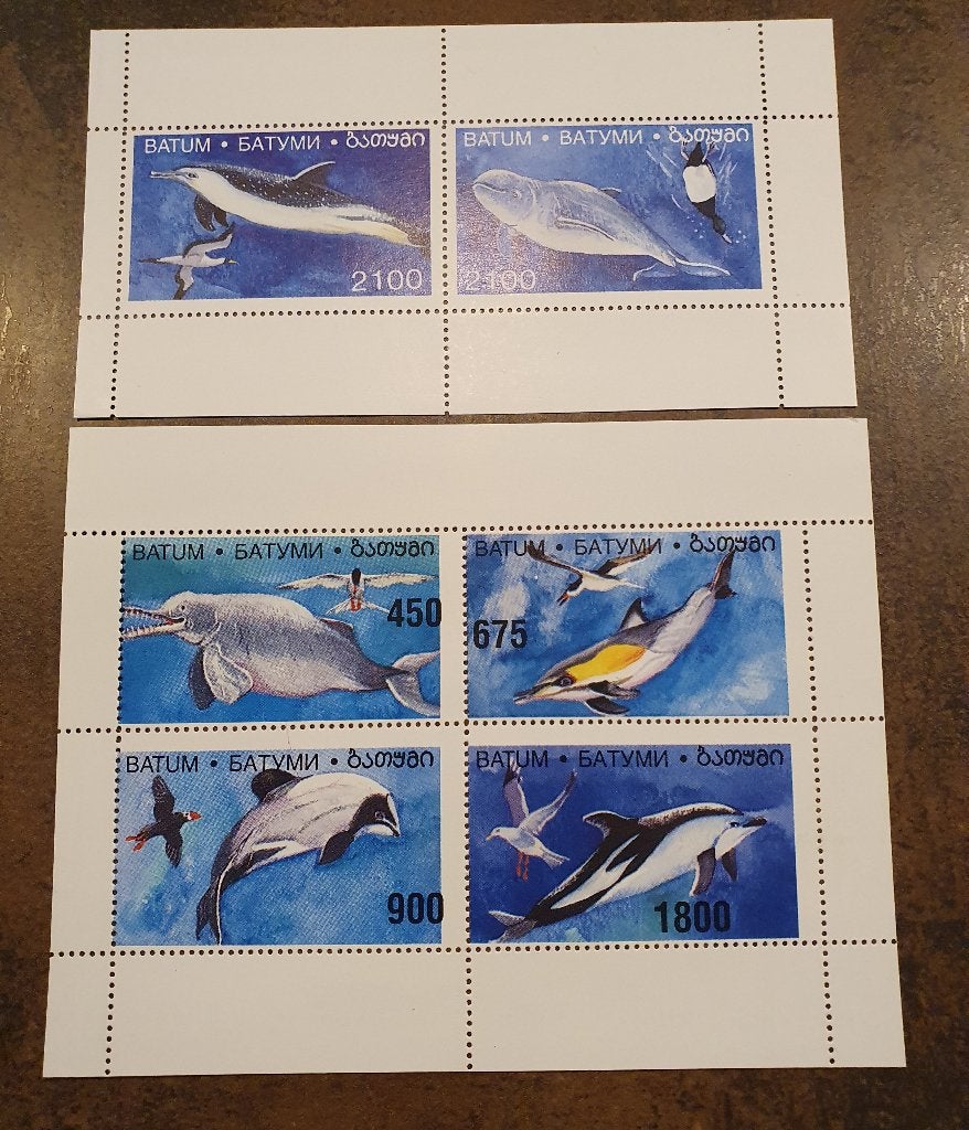2 postzegelvellen met dolfijnen, Ophalen of Verzenden, Buitenland