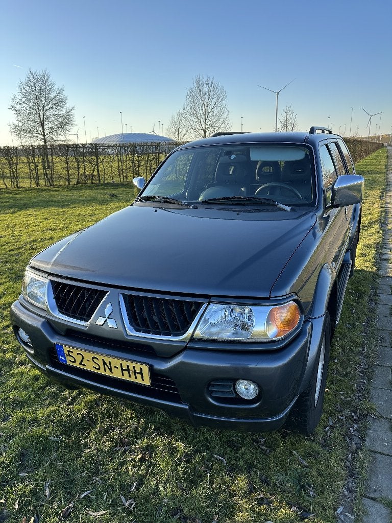 Mitsubishi Pajero Sport 3.0 V6 AUT 2006 Grijs, Auto's, Automaat, Zwart, 2800 kg, Particulier
