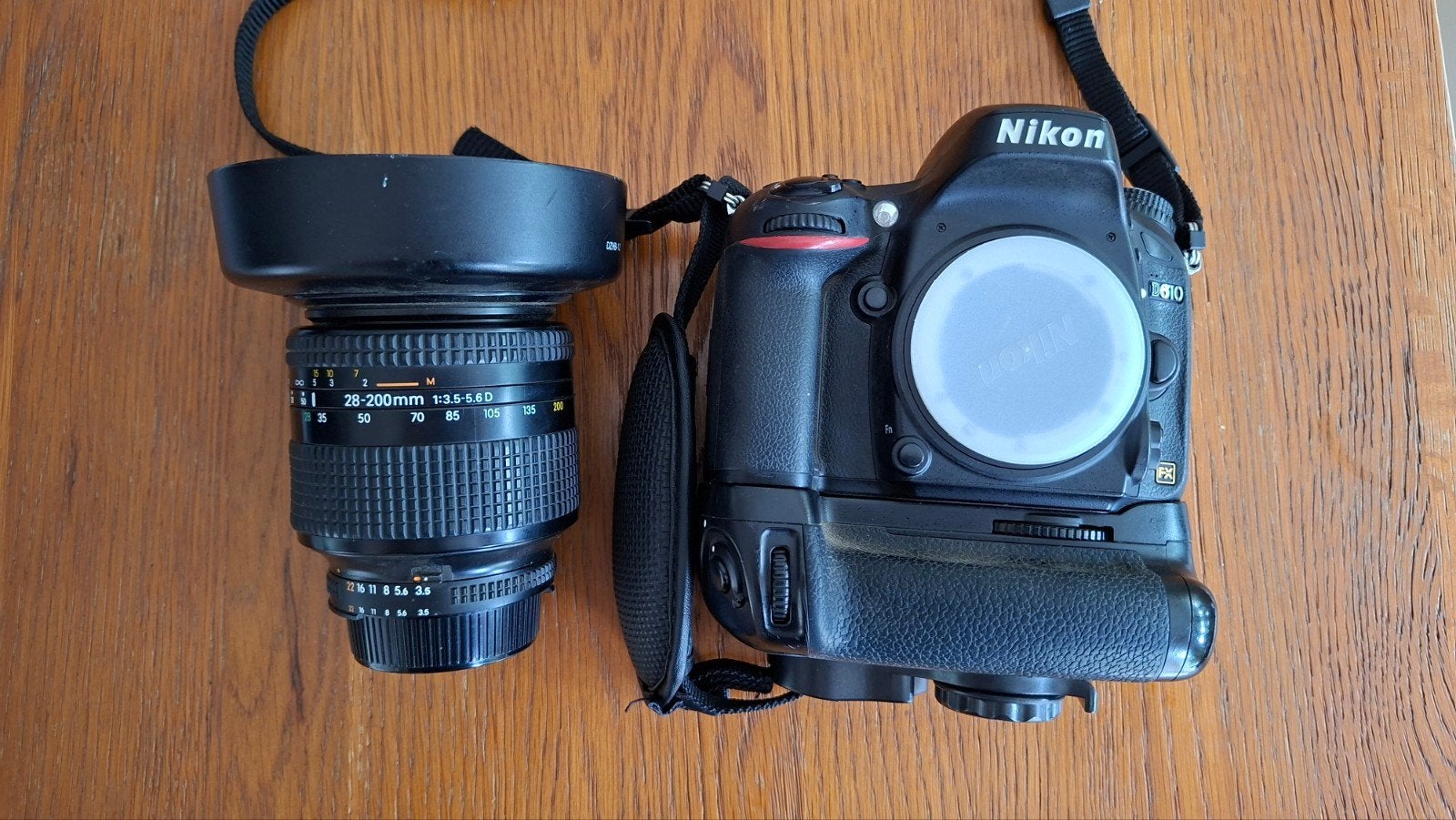 Te koop Nikon D610-body met 28-200mm lens., Ingebouwde flitser, Spiegelreflex, Ophalen of Verzenden, 24 megapixels