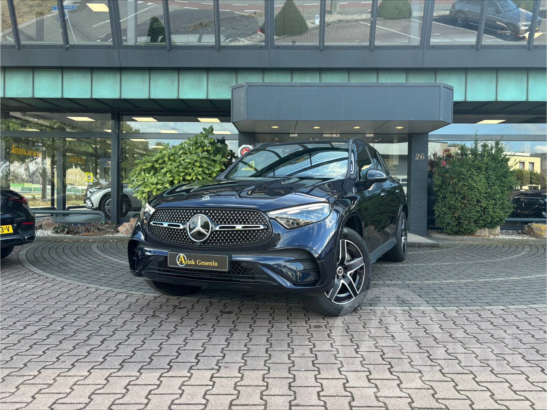 Mercedes-Benz GLC 300e 4MATIC AMG Line Panoramadak, Rijassis, Auto's, Automaat, 12 maanden, Gebruikt, Blauw