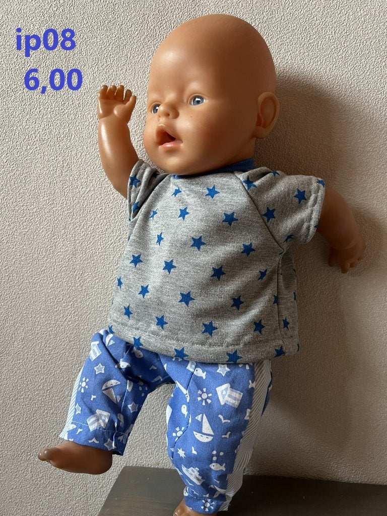 Poppenkleertjes baby born. Set. Opbrengst KiKa., Ophalen of Verzenden, Nieuw, Babypop
