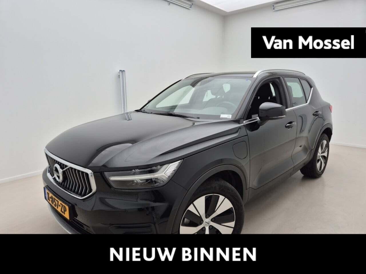 Volvo XC40 1.5 T4 Recharge Inscription Expression, Auto's, 12 maanden, Stof, Euro 6, Zwart