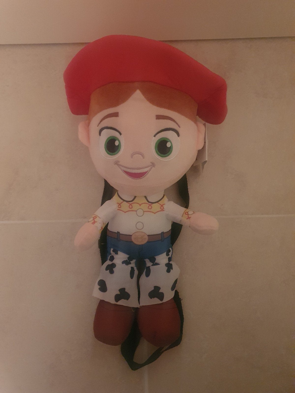 Te koop Disney Jessie rugtasje, Ophalen, Overige figuren, Beeldje of Figuurtje