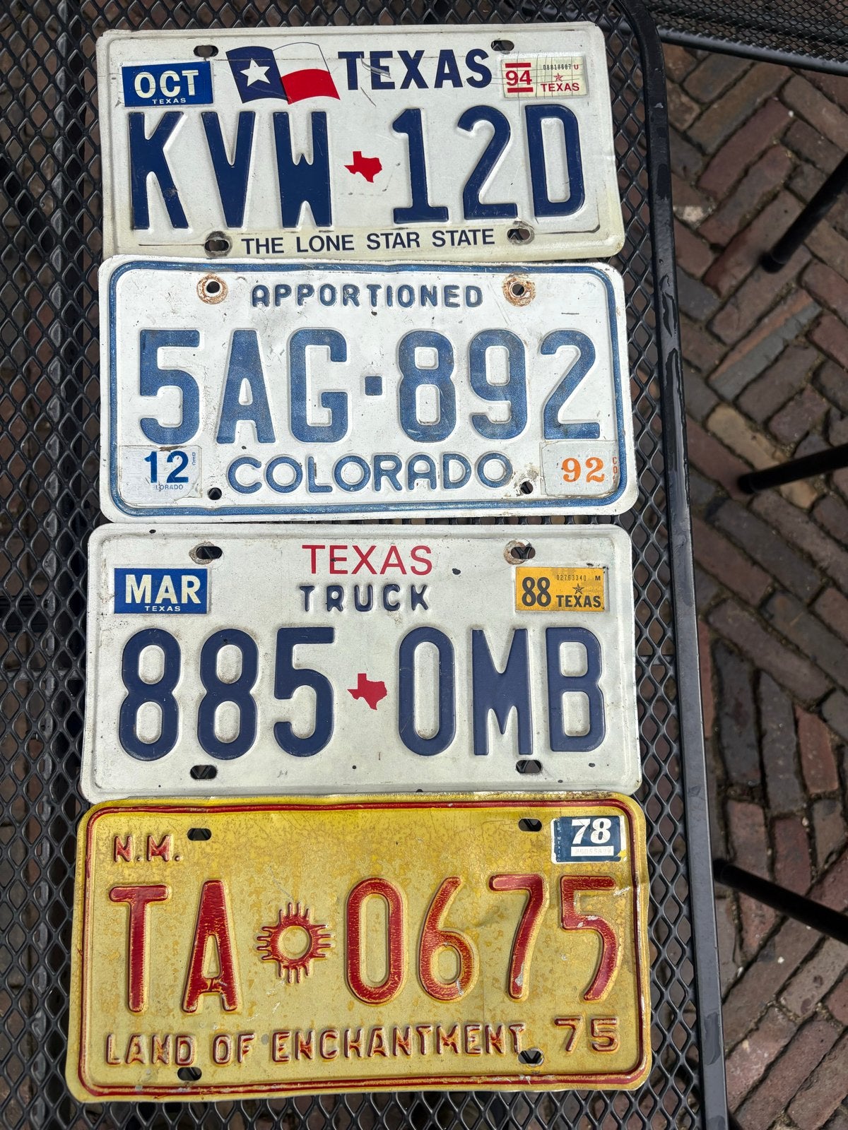 Set van 4 Amerikaanse kentekenplaten (Texas, Colorado, N.M.), Ophalen