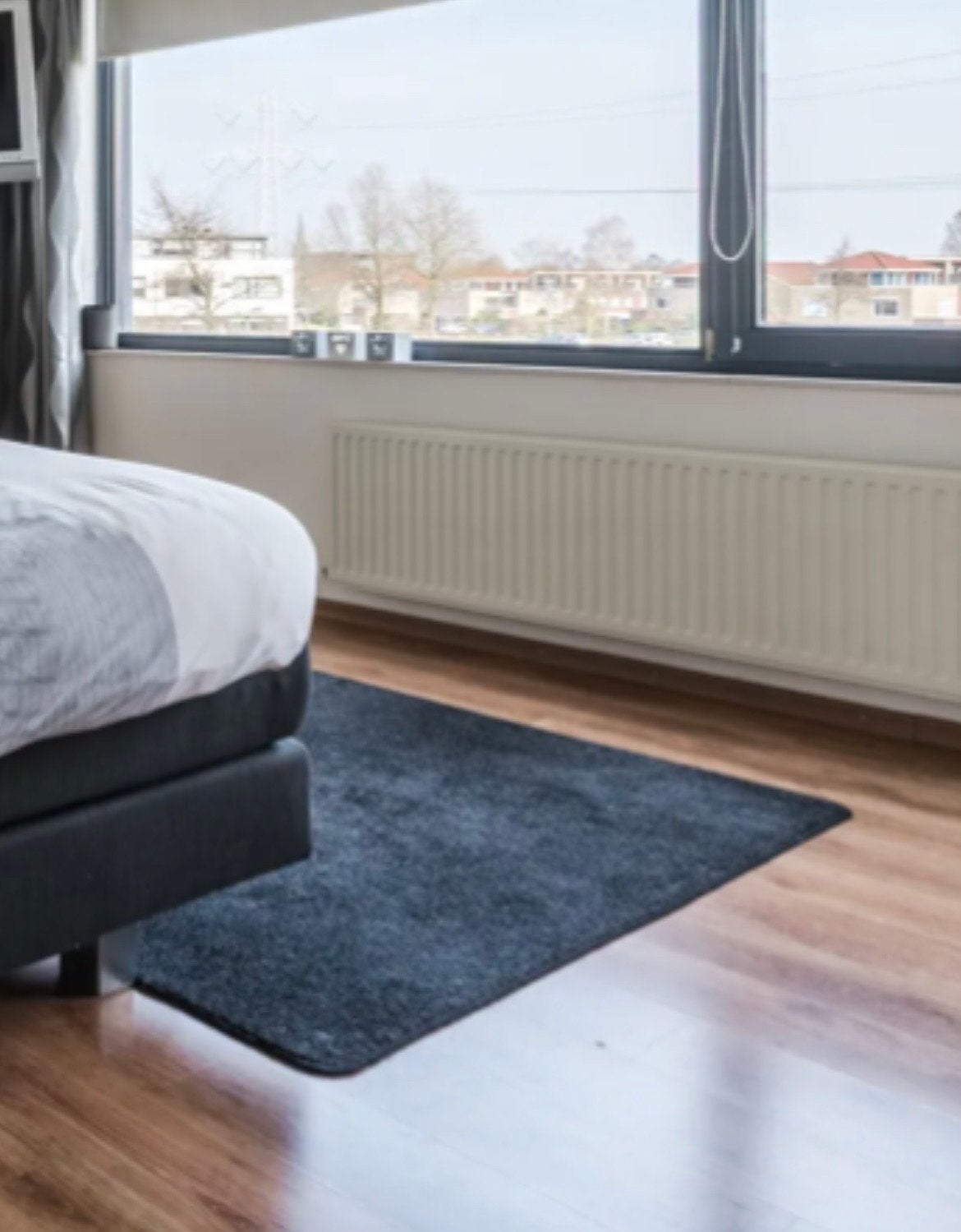 Zwart vloerkleed, zacht en modern, Ophalen, 100 tot 150 cm, Zwart, Zo goed als nieuw