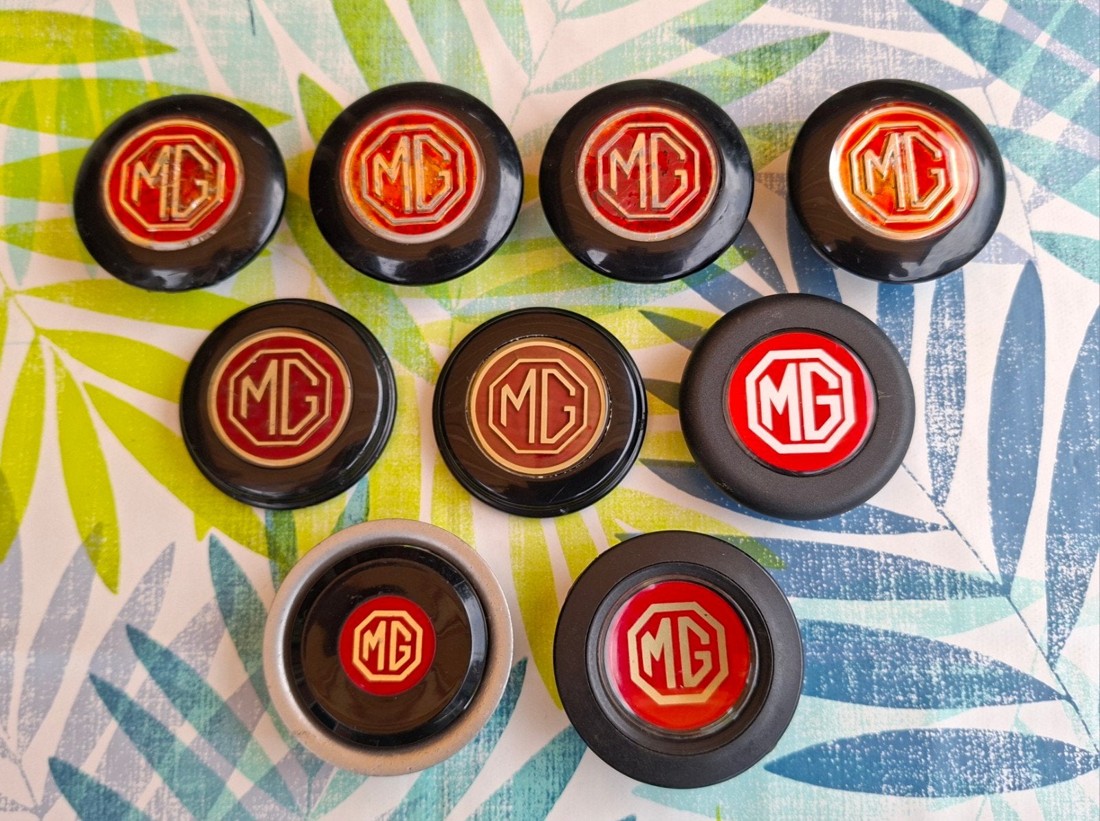 9x MG stuurnaaf en claxondoppen in één koop., Ophalen of Verzenden