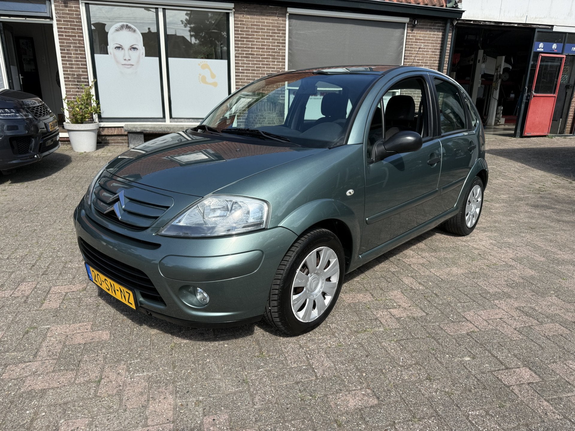 Citroën C3 1.4i-16V Sky Radio (bj 2006, automaat), Auto's, Zwart, 4 cilinders, Origineel Nederlands, Bedrijf