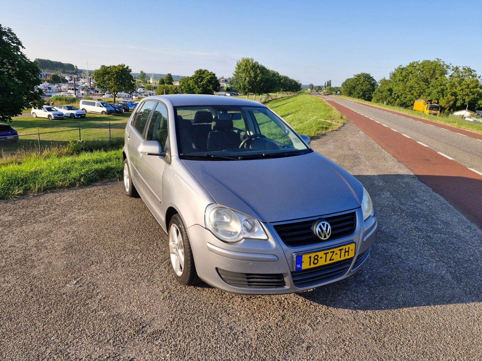 Volkswagen Polo 1.4 16V 59KW 2007 Grijs, Auto's, Voorwielaandrijving, Stof, 40 €/maand, 4 cilinders
