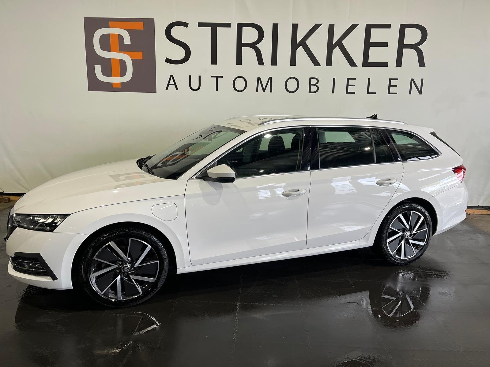 Skoda Octavia Combi 1.4 TSI iV PHEV Business Edition, Auto's, Adaptive Cruise Control, Stof, Gebruikt, 150 pk