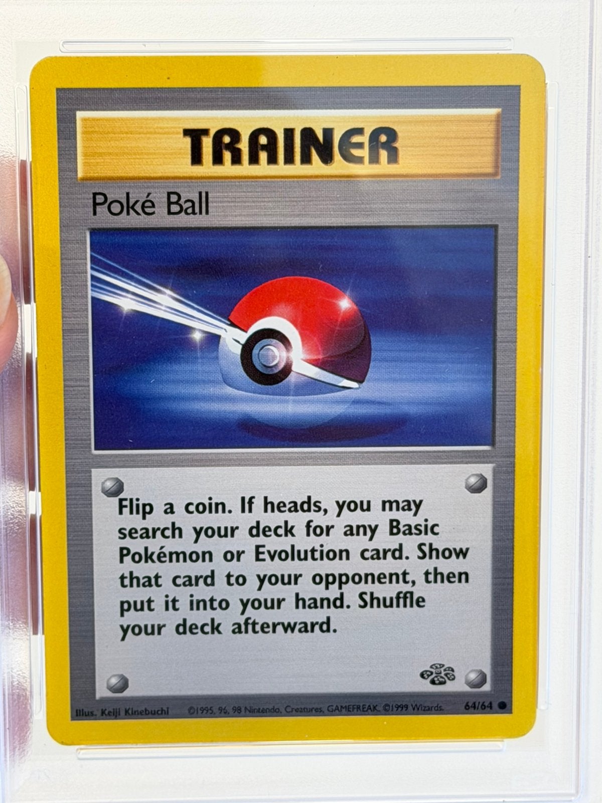 1999 Pokémon Poké Ball 64/64 Jungle PSA 7 Vintage WOTC #64, Hobby en Vrije tijd, Ophalen of Verzenden, Zo goed als nieuw, Losse kaart