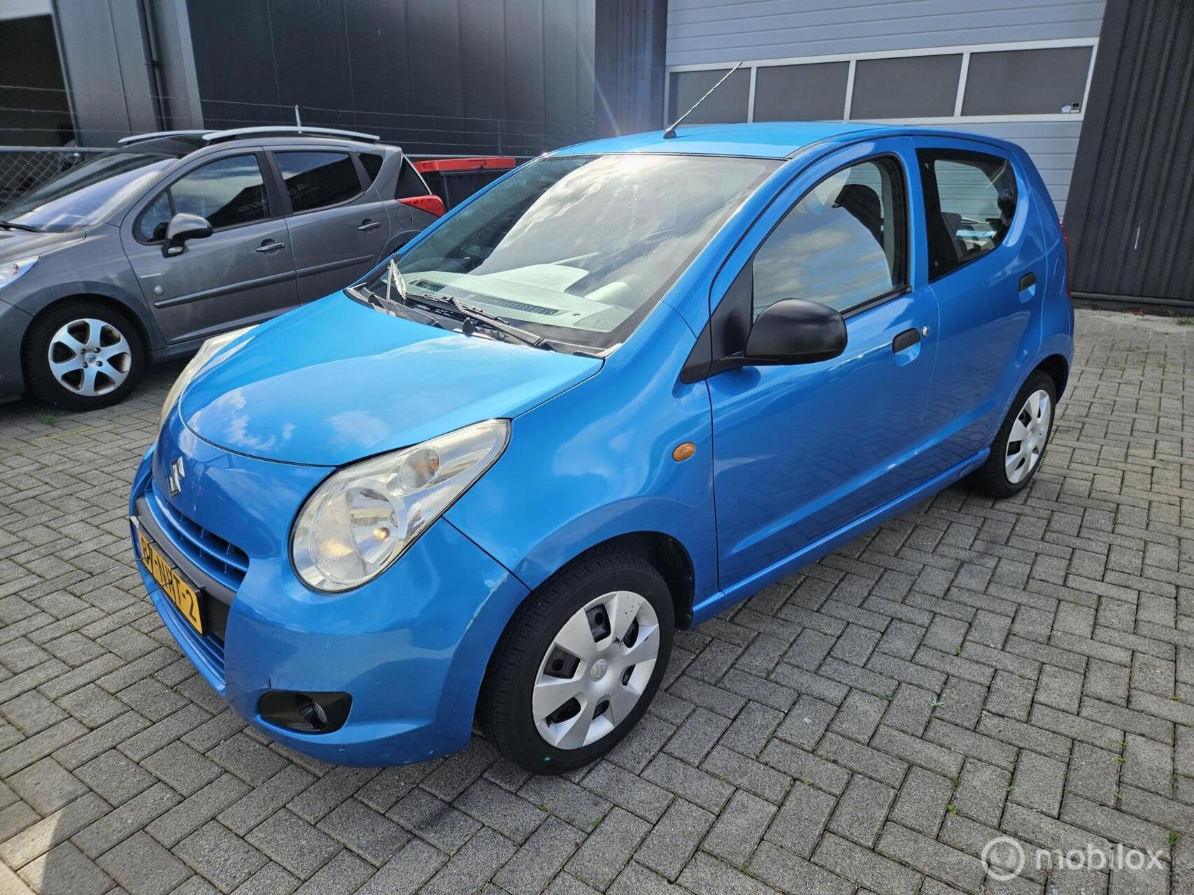 Suzuki Alto 1.0 Exclusive met NIEUW KOPPELING/AIRCO/APK 09/2, Auto's, Voorwielaandrijving, Euro 5, 200 kg, Blauw