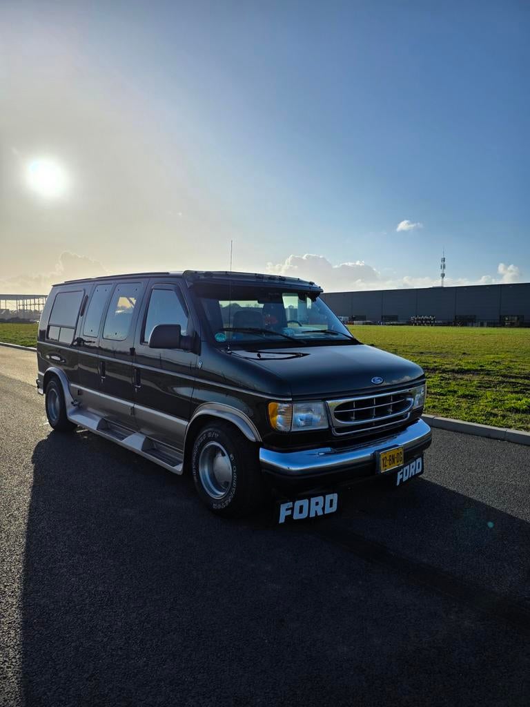 Ford Econoline E150 Globemaster 1995, Auto's, Zwart, 209 pk, Ford, Te koop