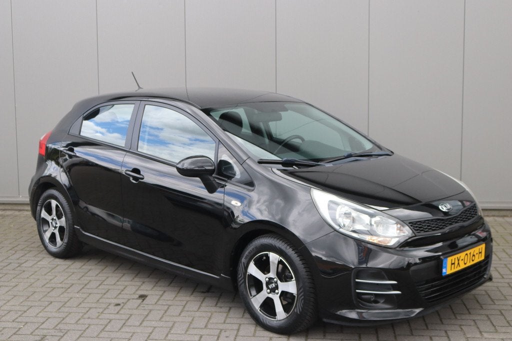 Kia Rio 1.2 CVVT 83PK ComfortLine Cruise-control/Airco/Elekt, 4 cilinders, Met garantie (alle), Zwart, Origineel Nederlands