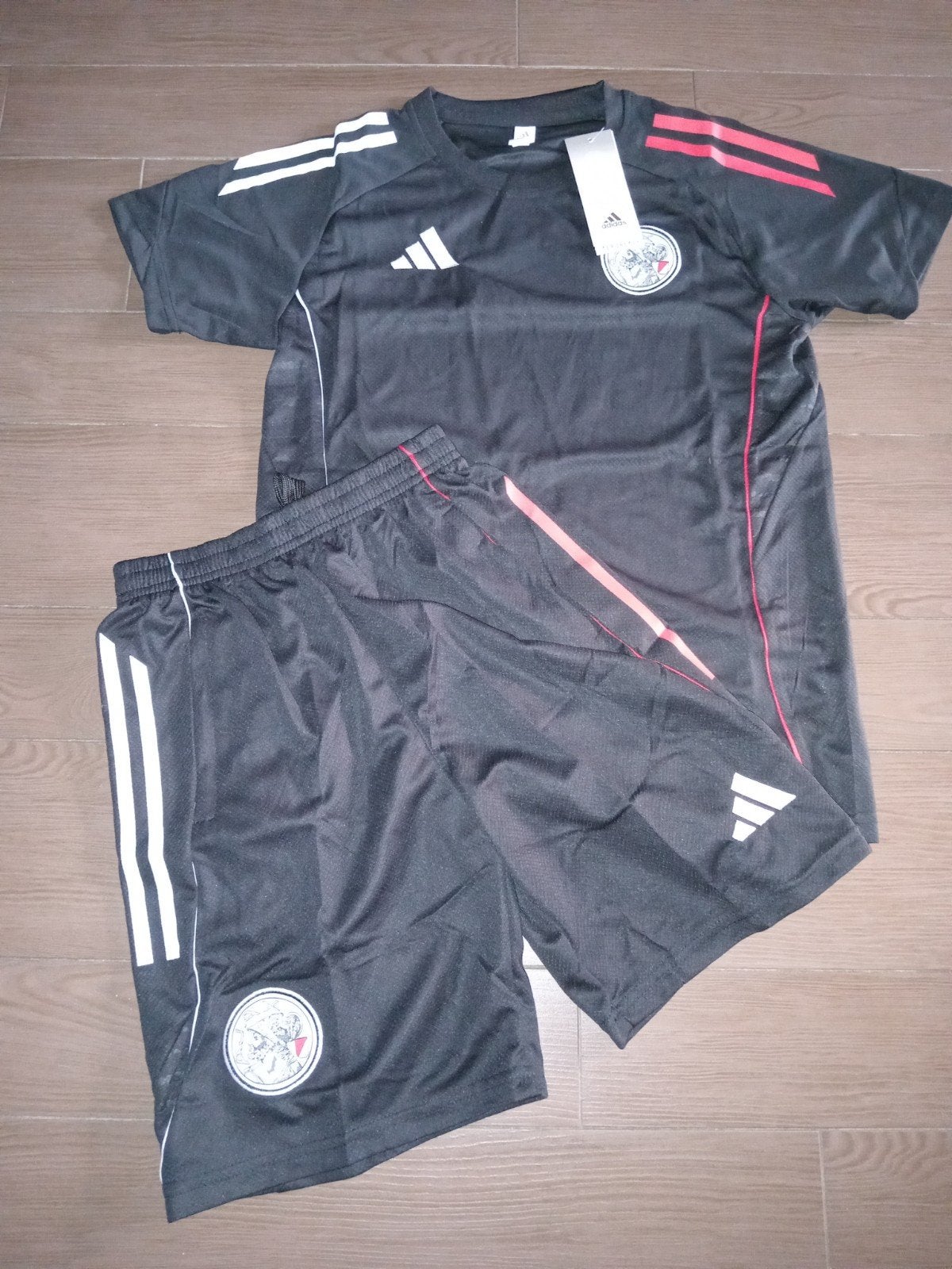 Nieuw Ajax Trainingsset Kids Maat 110-116 met zakken, Kinderen en Baby's, Kinderkleding | Overige, Ophalen of Verzenden, Nieuw
