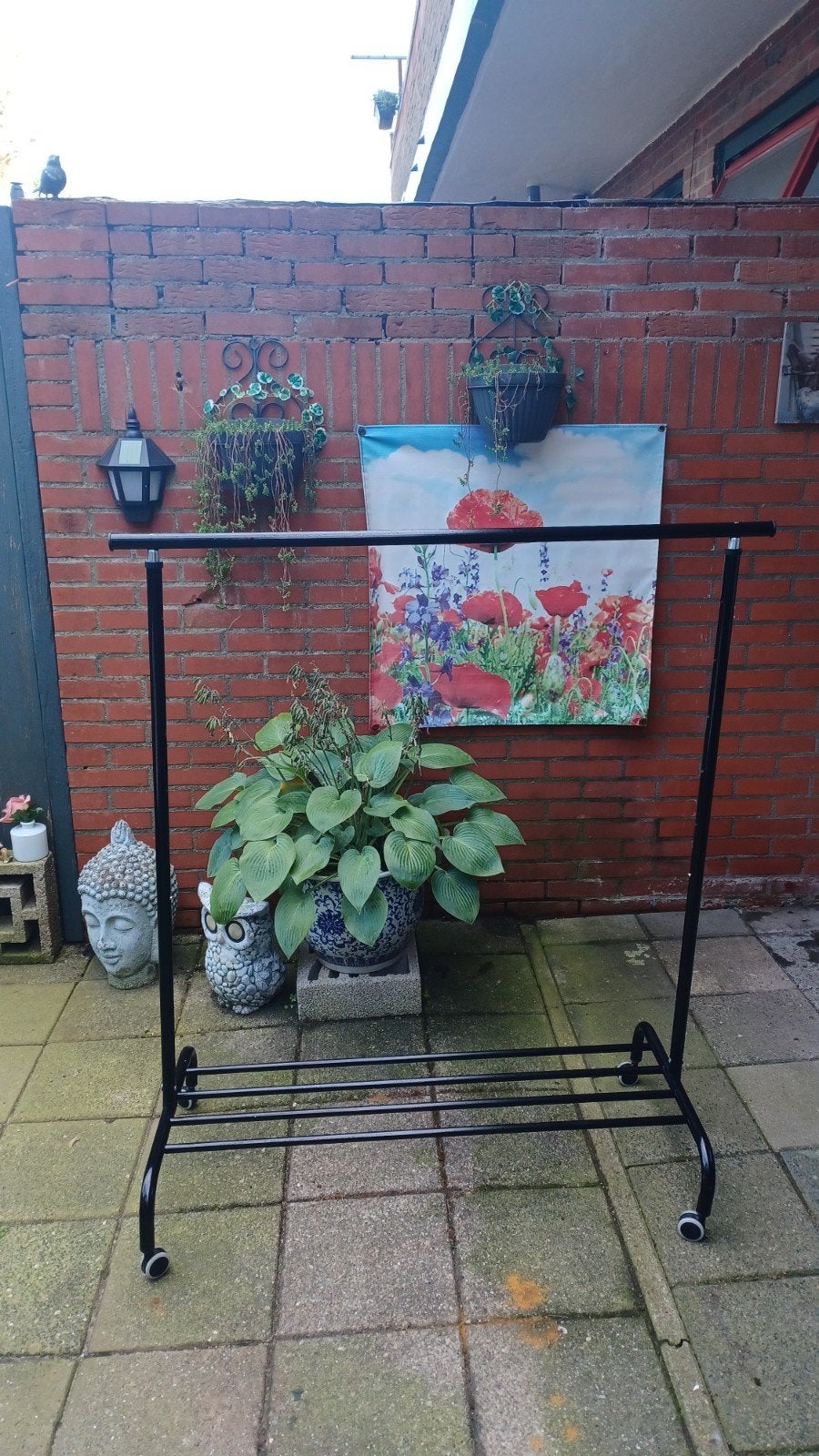 kledingrek, Ophalen, Zo goed als nieuw