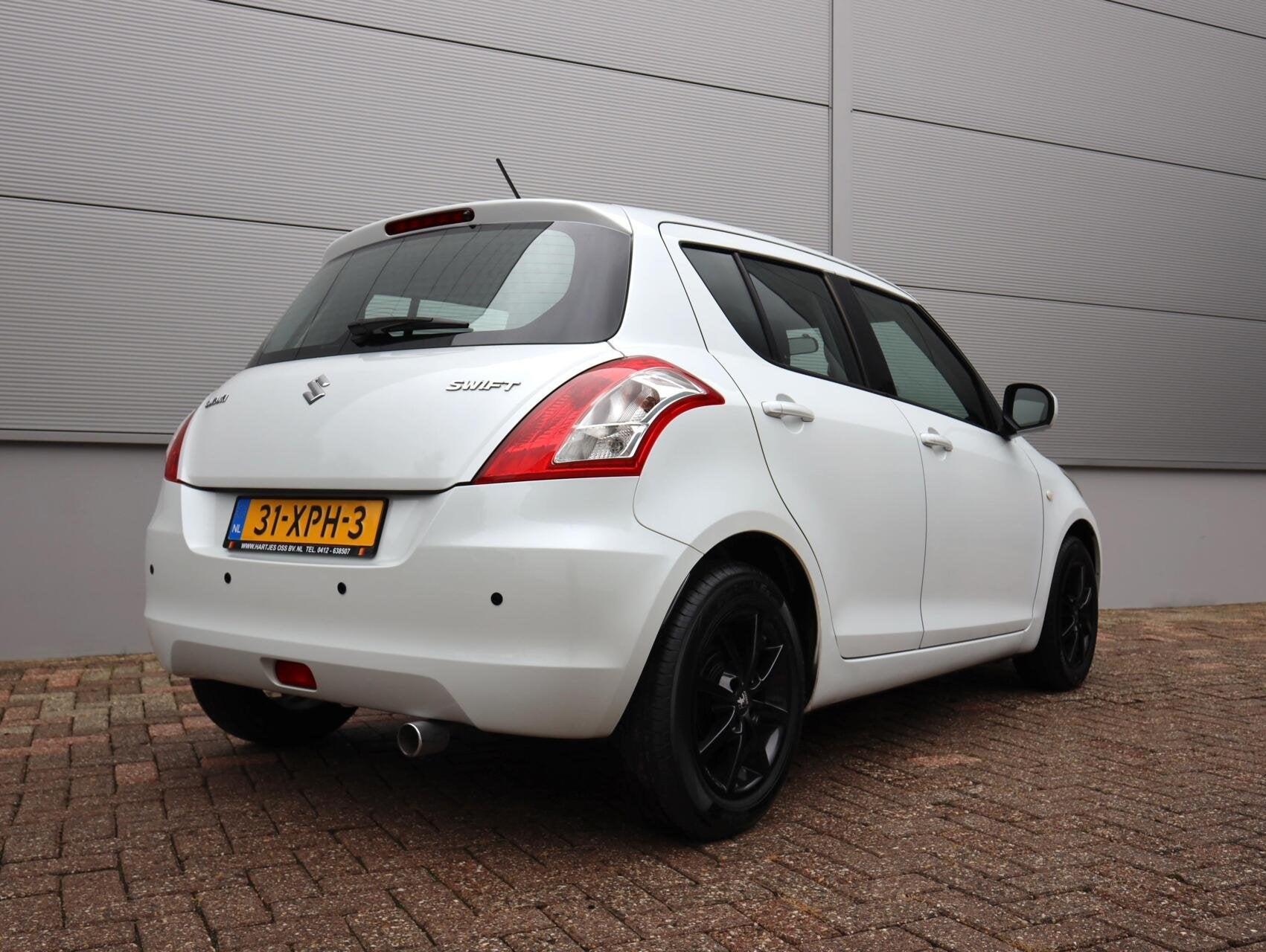 Suzuki Swift 1.2 Summer 5drs. (Vol-Opties) Parelmoer NL-auto, Auto's, Voorwielaandrijving, Gebruikt, 4 cilinders, Met garantie (alle)
