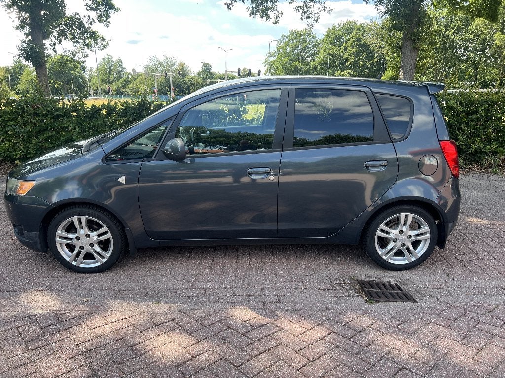 Mitsubishi Colt 1.3 CZ5 2009 Grijs, Auto's, Mitsubishi, Stof, 31 €/maand, Colt, Origineel Nederlands