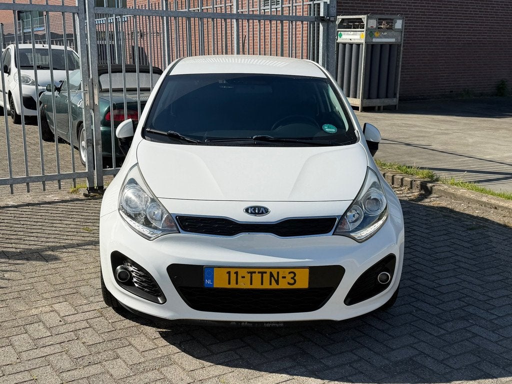 Kia Rio 1.2 CVVT Super Pack NL AUTO NAP! NAVI l Camera l Cru, Euro 5, Zwart, 4 cilinders, Wit