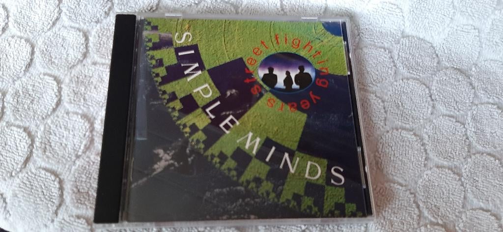 CD - Simple Minds - Street fighting years, Ophalen of Verzenden, Zo goed als nieuw