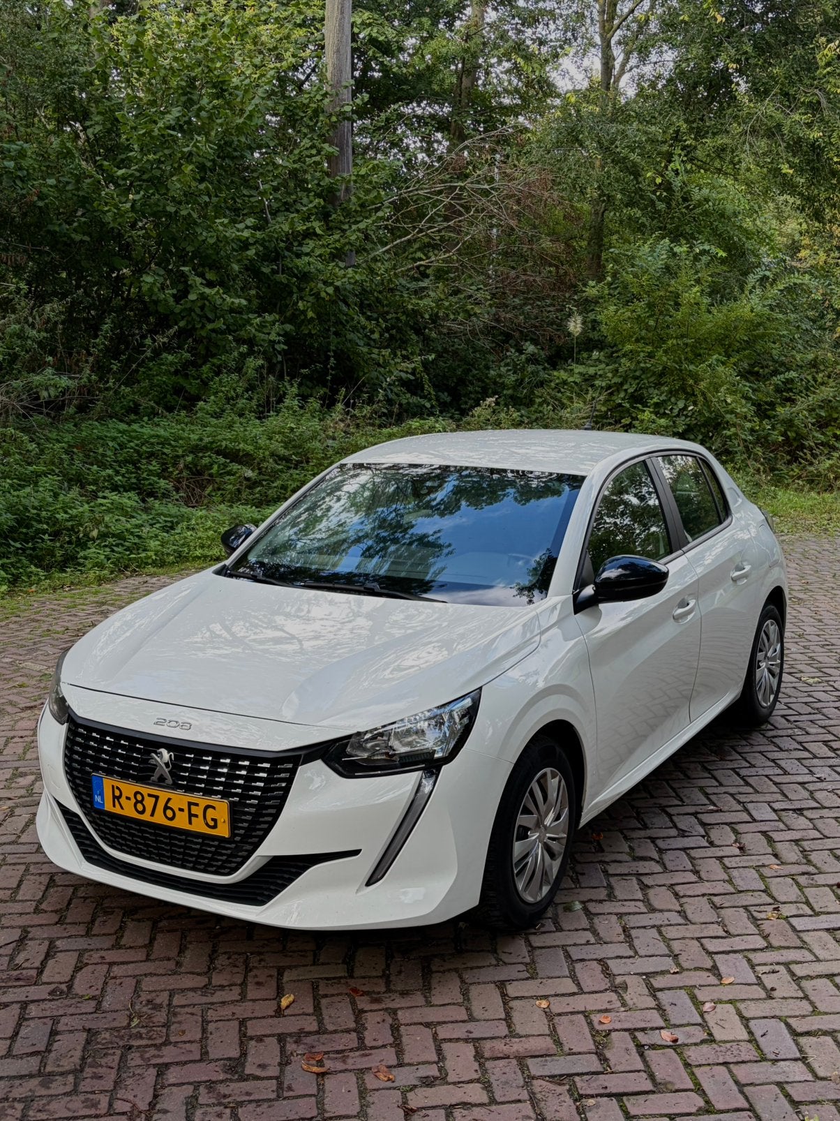 Peugeot 208 1.2 Puretech 75pk 2022 Wit, Auto's, Voorwielaandrijving, Stof, 1199 cc, Wit