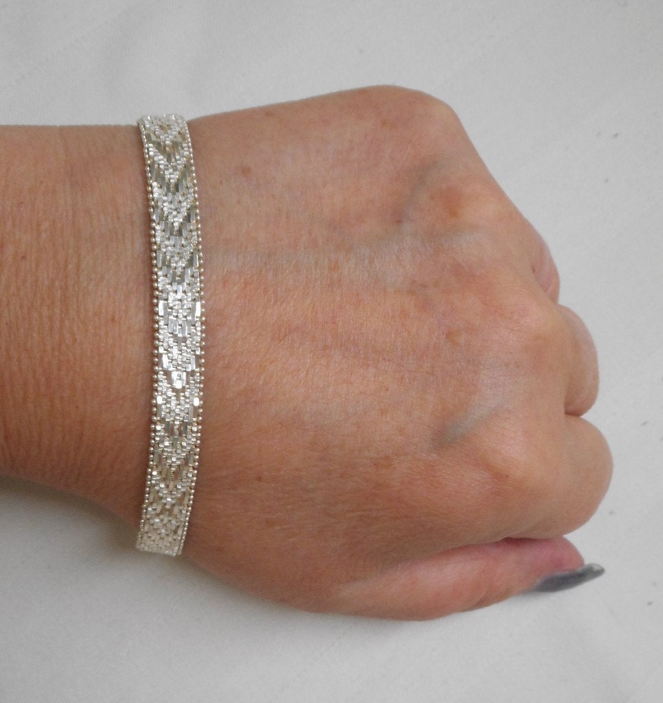 Zilveren platte schakel armband nr.1204